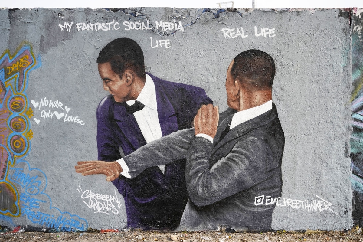 Will Smith and Chris Rock Graffiti mural in Berlin by Dominican artist Jesus Cruz Artiles aka EME Freethinker