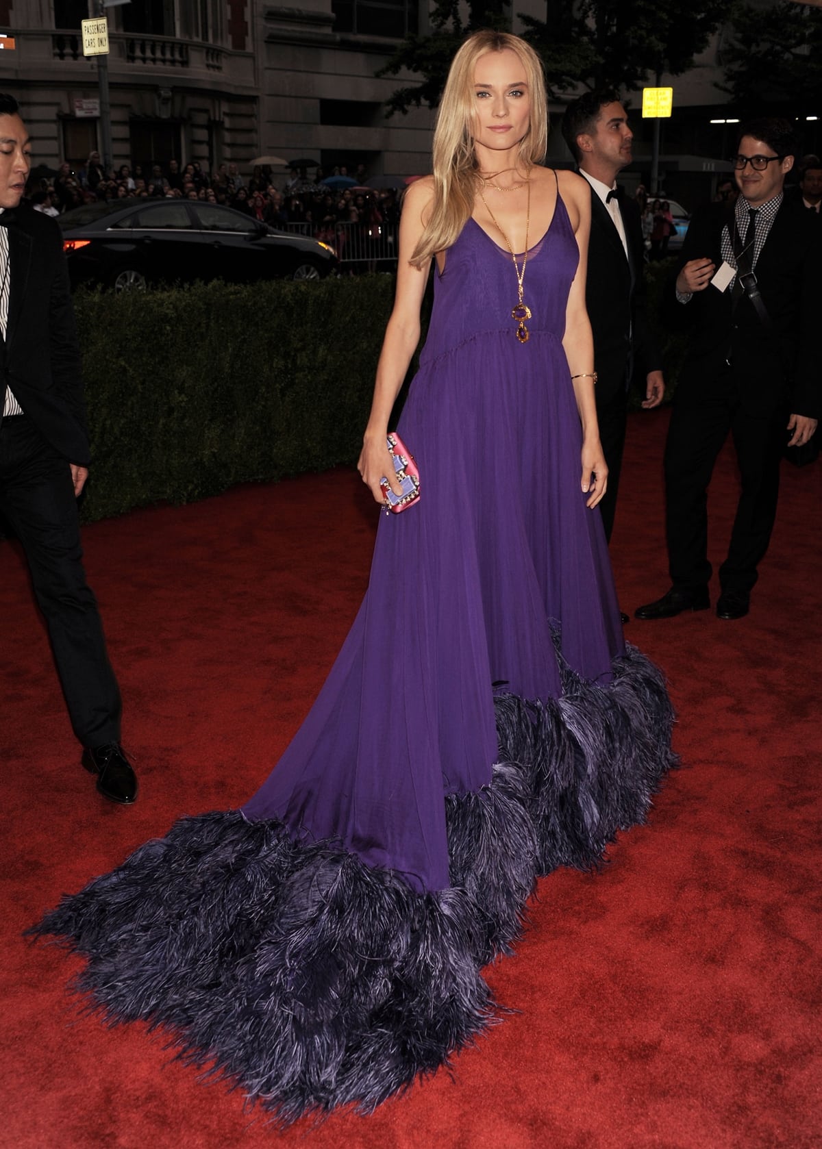 Diane Kruger styled a purple Prada gown with a clutch and shoes from the same fashion house