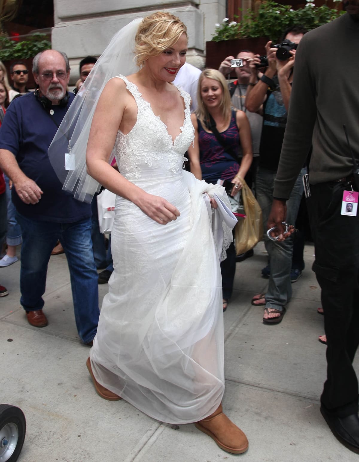 During the production of Sex And The City 2 in 2009, Kim Cattrall caught attention in New York City as she sported Ugg boots while donning her white bridesmaid's dress