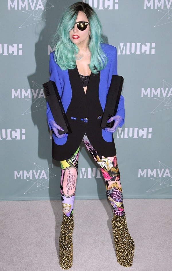 Lady Gaga holds her awards inside the Press Room at the 22nd Annual MuchMusic Video Awards