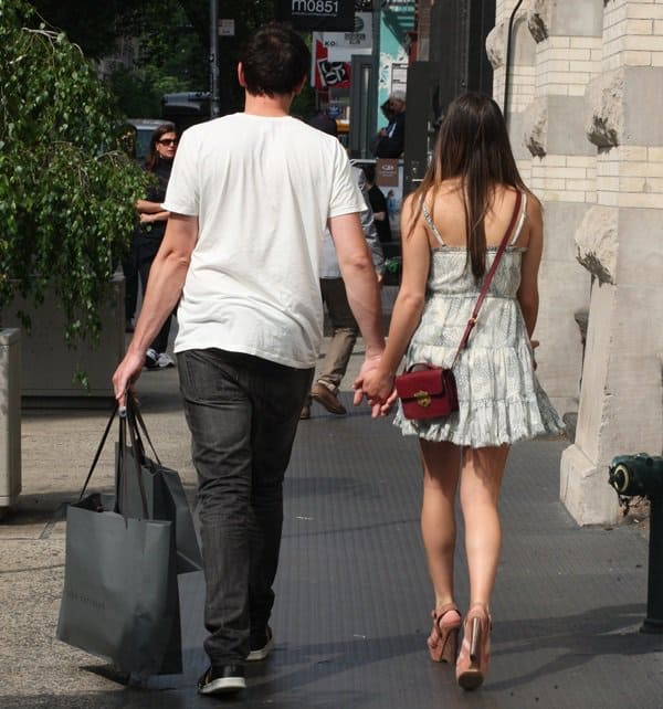 Lea Michele and boyfriend Cory Monteith holding hands while shopping in Manhattan