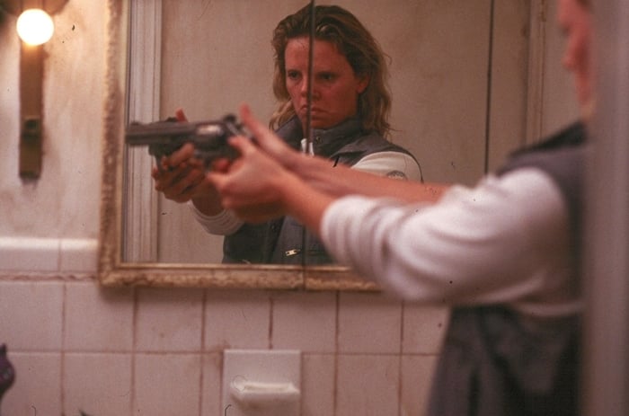 Charlize Theron portrays serial killer Aileen Wuornos, a former street prostitute, in the 2003 biographical crime drama film Monster
