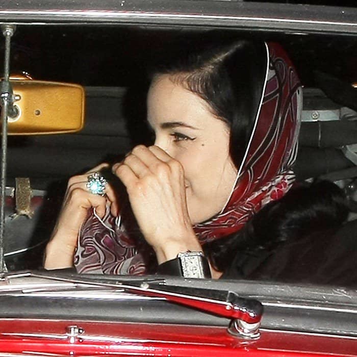 Dita Von Teese stylishly kept her hair in place by wearing a scarf draped over her head