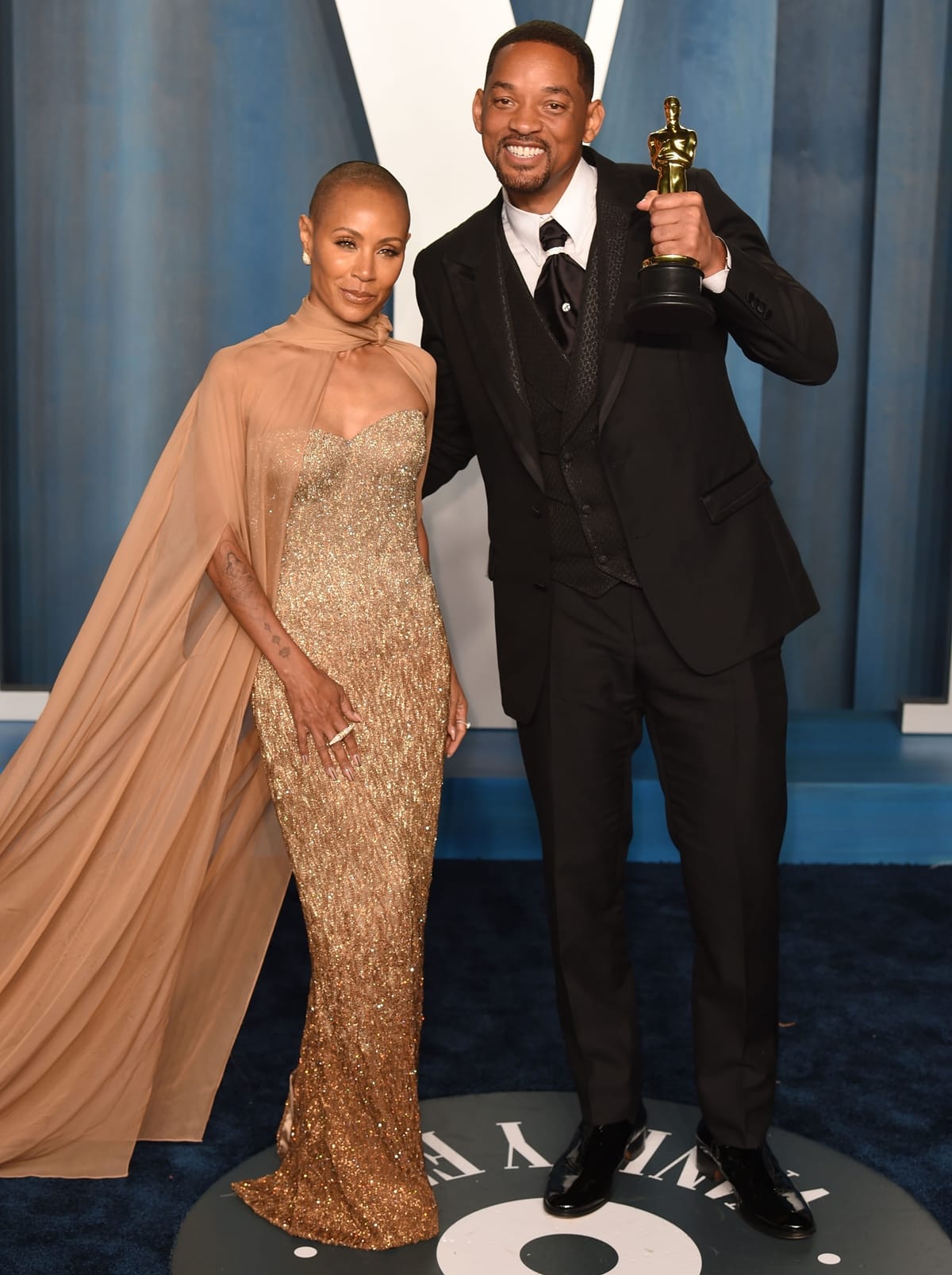 Jada Pinkett Smith in a strapless Dolce & Gabbana dress covered with Swarovski crystals and Will Smith in a Dolce & Gabbana mohair wool tuxedo