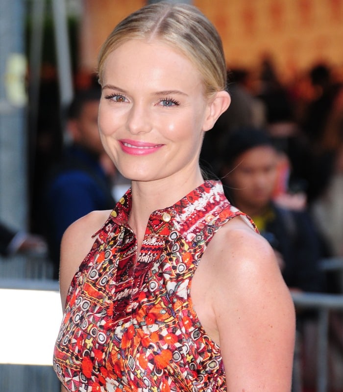 Kate Bosworth with her hair swept back in a colorful cutout Altuzarra “Laal” dress