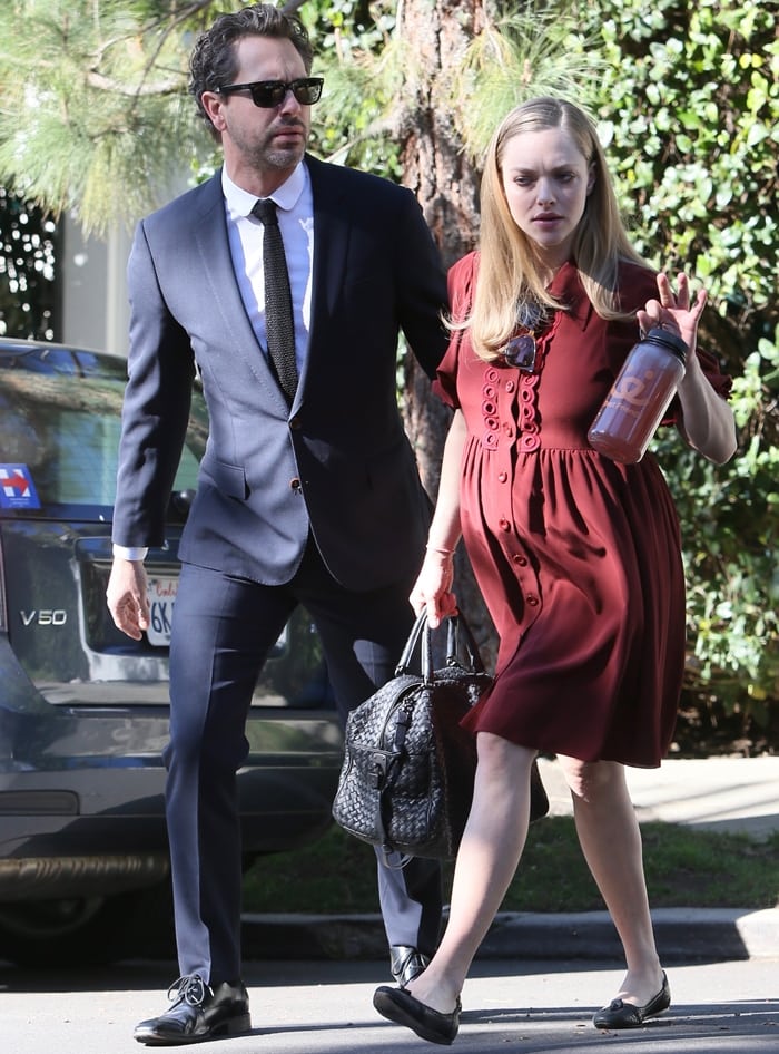 Pregnant Amanda Seyfried shows off her baby bump while out with her fiancé Thomas Sadoski