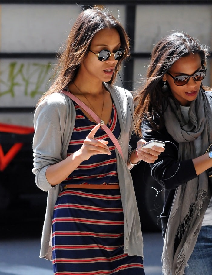 Zoe Saldaña was spotted enjoying a stroll through New York City on May 11, looking stunning in a striped Madewell dress