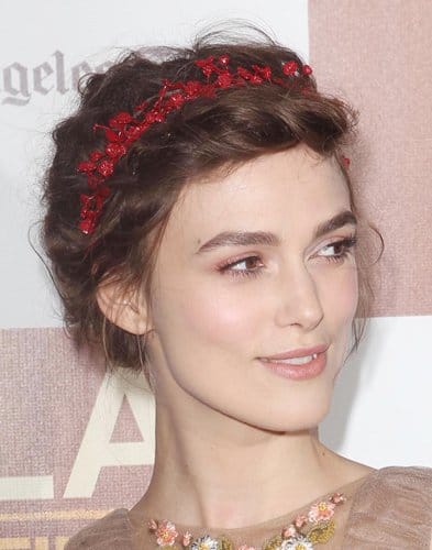 Keira Knightley charms with Victorian-inspired tiny red florettes at the 'Seeking a Friend for the End of the World' premiere