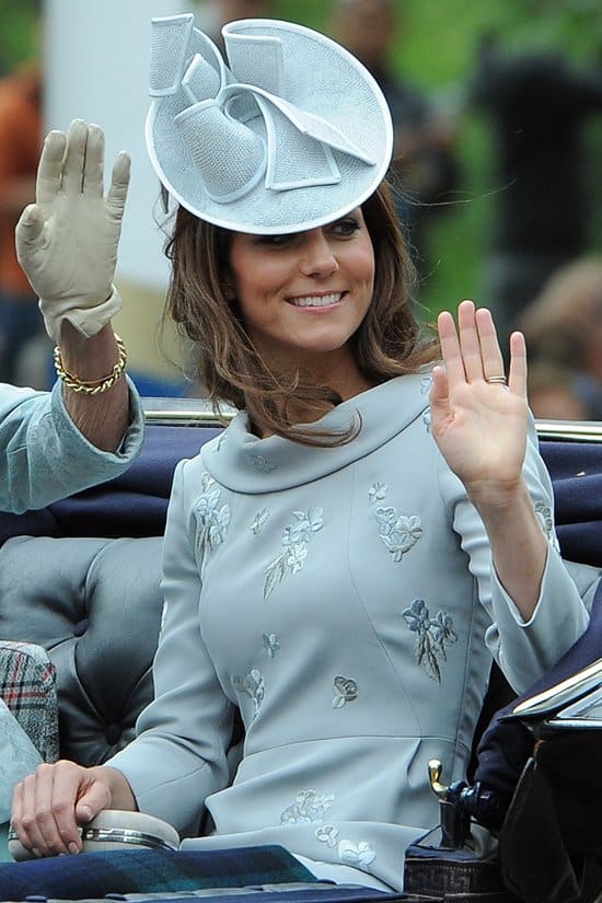 Kate Middleton wore a pale blue Erdem dress and a hat by milliner Jane Corbett