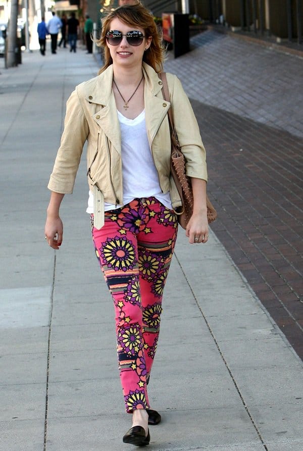 On July 6, 2012, in Los Angeles, Emma Roberts was seen sporting Textile Elizabeth and James Deb Deb printed kaleidoscope skinny jeans, paired with Jenni Kayne d'Orsay flats and accessorizing with a Christian Louboutin Justine spike stud tote