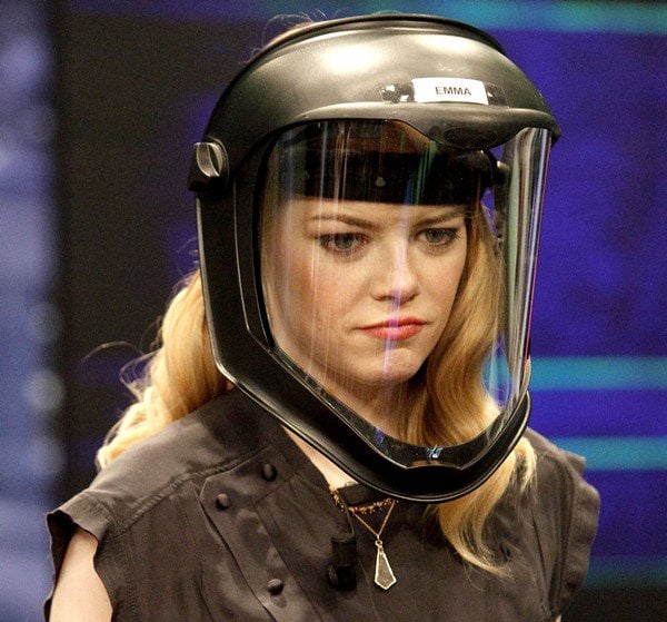 Emma Stone wears a face mask as part of a game during her appearance on Spanish TV show "El Hormiguero"