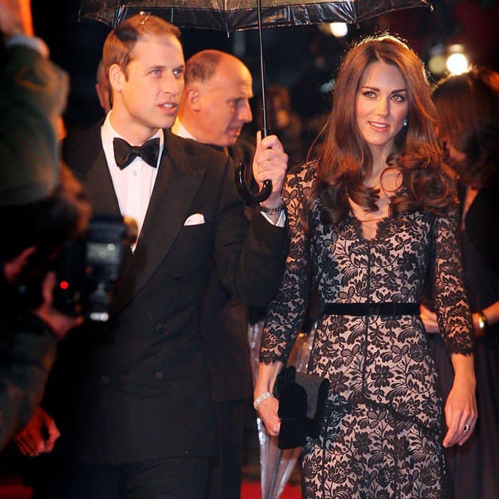The Duchess of Cambridge, Kate Middleton, epitomizes grace and elegance in her black lace gown at the 'War Horse' UK premiere, with Prince William by her side