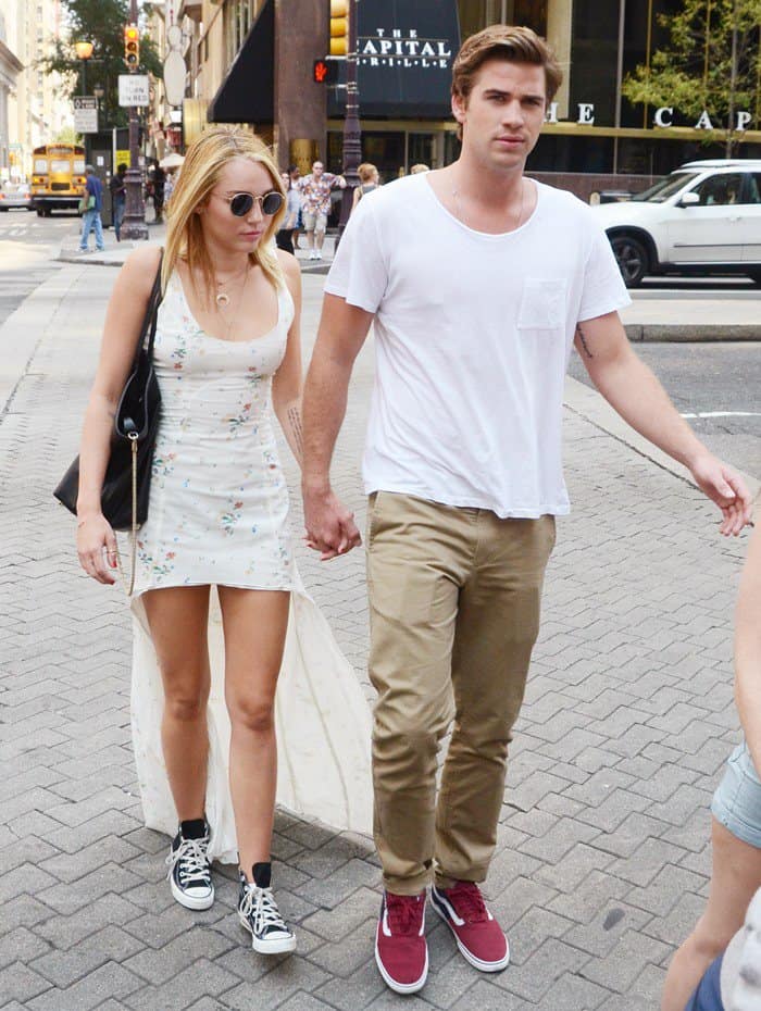 Miley Cyrus and her fiancé Liam Hemsworth were seen holding hands as they left the Capital Grille after lunch in Philadelphia, Pennsylvania