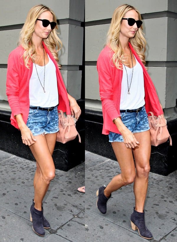 Stacy Keibler flaunted her legs in denim cutoff shorts styled with a coral cardigan
