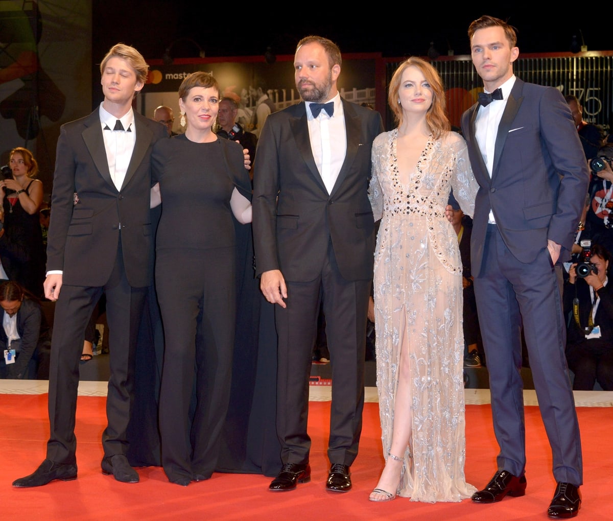 Joe Alwyn, Olivia Colman, Yorgos Lanthimos, Emma Stone, and Nicholas Hoult walk the red carpet ahead of The Favorite screening during the 75th Venice Film Festival