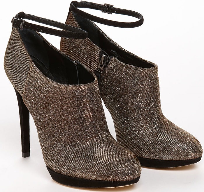 An inside zip and glitter-infused fabric elevate an abbreviated bootie topped with a slim ankle strap