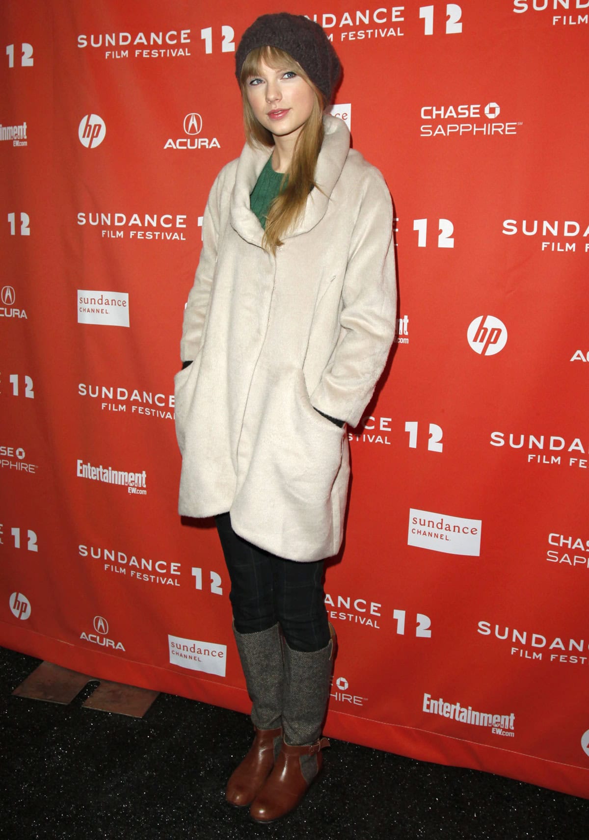 Taylor Swift bundled up in a cozy Kymerah Chrysalis coat, herringbone Schuler & Sons boots, and a slouchy Urban Outfitters beanie at the Sundance Film Festival on January 20, 2012