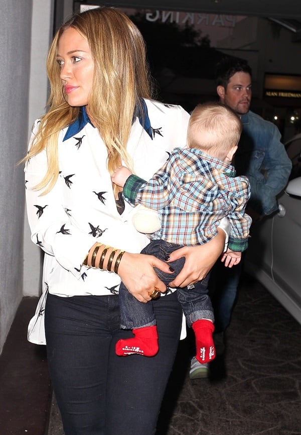 Hilary Duff wears cropped skinny jeans with a patterned blouse while out for a birthday dinner in Beverly Hills