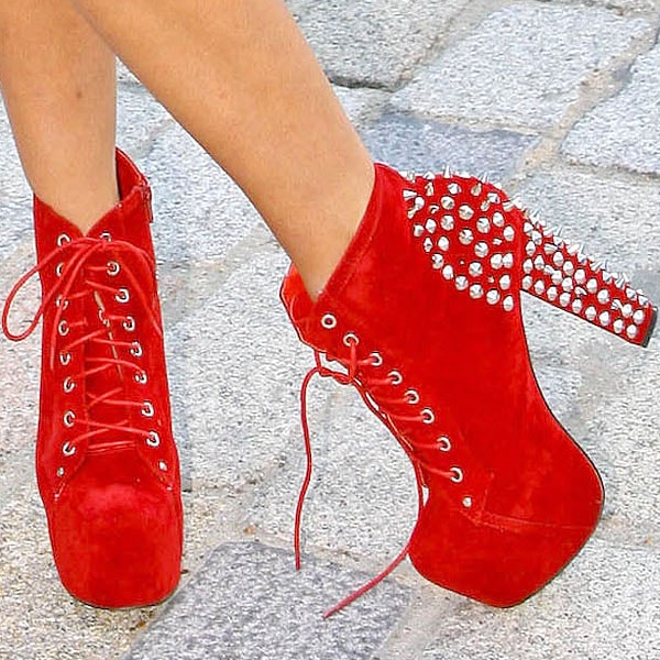 Jameela Jamil rocks red studded ankle boots with high heels