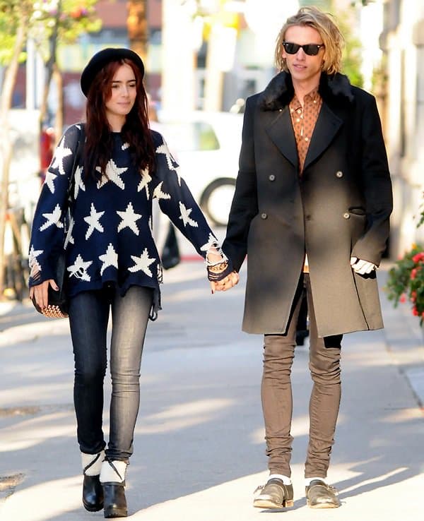 Lily Collins and her boyfriend Jamie Campbell Bower out for a stroll in Toronto