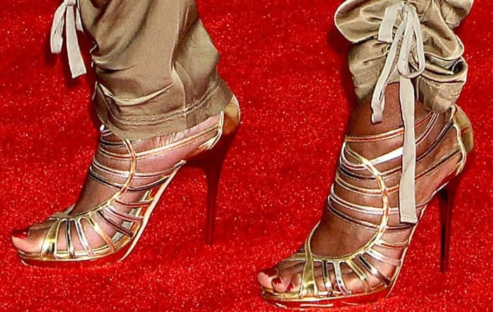 Mary J. Blige shows off her oxblood toenails in a pair of strappy sandals. Can you help us identify them?