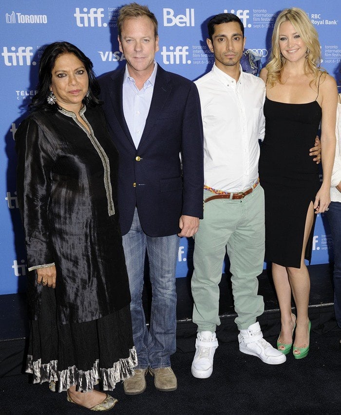Mira Nair, Kiefer Sutherland, Riz Ahmed and Kate Hudson pose for photos on the black carpet