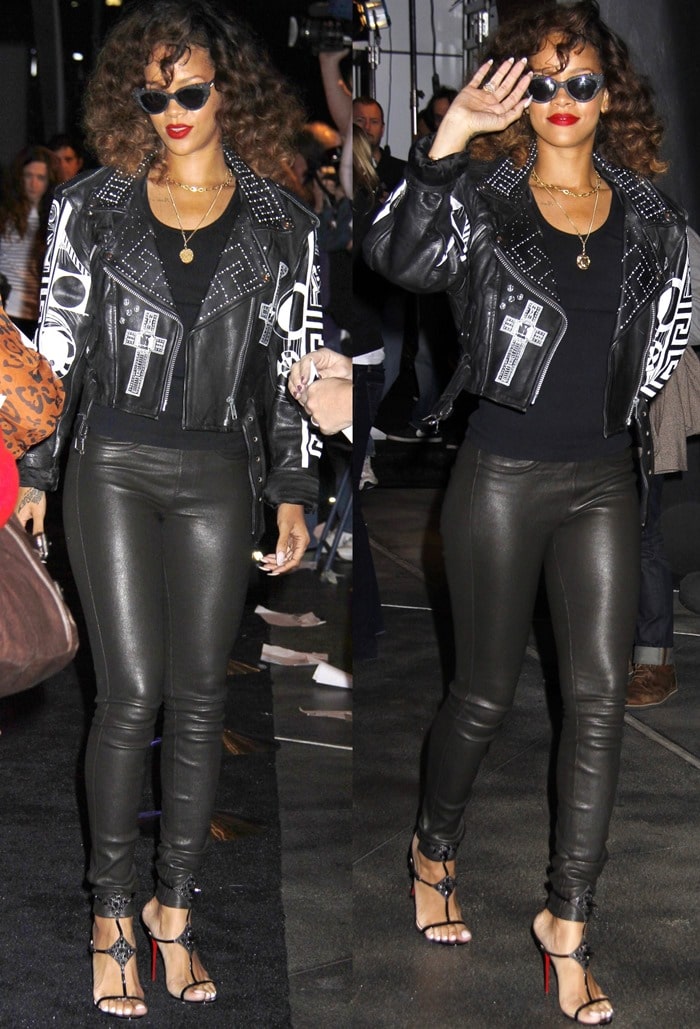 Rihanna rocks an edgy all-black ensemble featuring leather leggings, a statement jacket, and Christian Louboutin 'Lady Max' Spike sandals