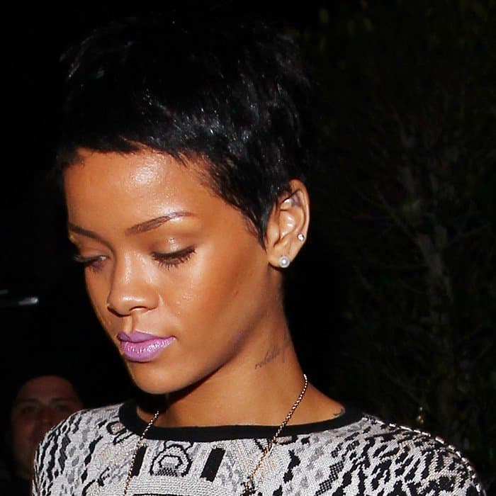 Rihanna rocks a pixie cut and soft lavender lipstick