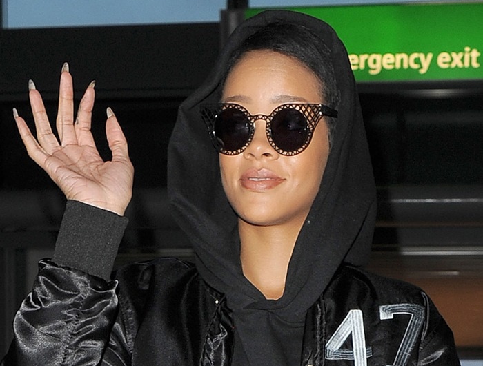   Rihanna leaves her hotel early in the morning to make her way to Heathrow airport in London on September 27, 2012