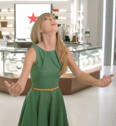 Taylor Swift radiates elegance in a pleated green ModCloth dress in the latest Macy's TV ad