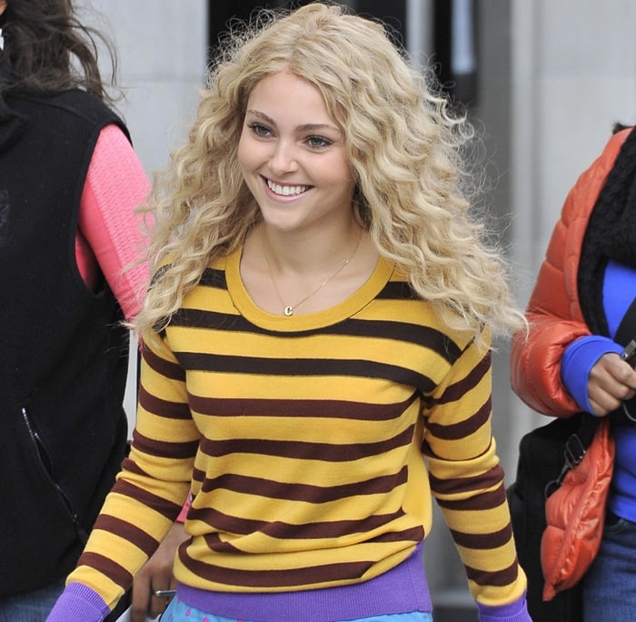 AnnaSophia Robb rocks a striped yellow sweater