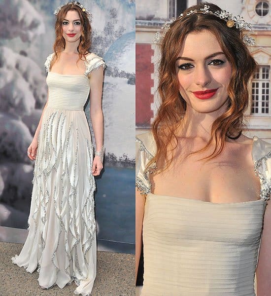 Fairy-tale splendor: Anne Hathaway arrives in a dreamy Valentino dress with a floral headpiece at the White Fairy Tale Love Ball