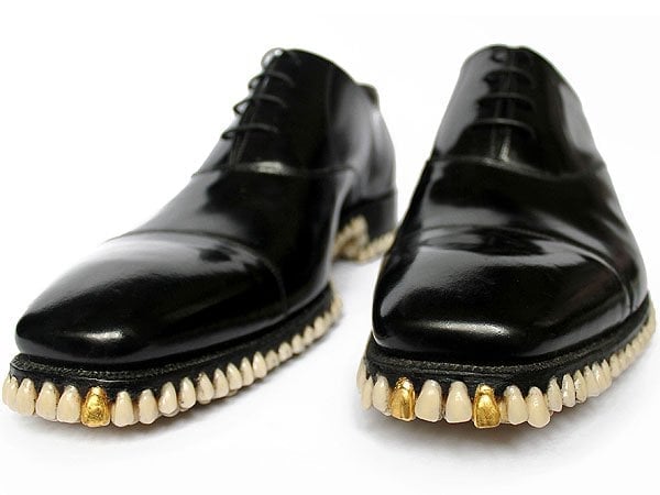 To add an extra touch of peculiarity, they finished the shoes with two gold teeth at the toes