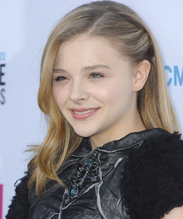 Chloë Grace Moretz wears a stylish black dress from the Chanel Fall 2012 collection at the 17th Annual Critic's Choice Movie Awards