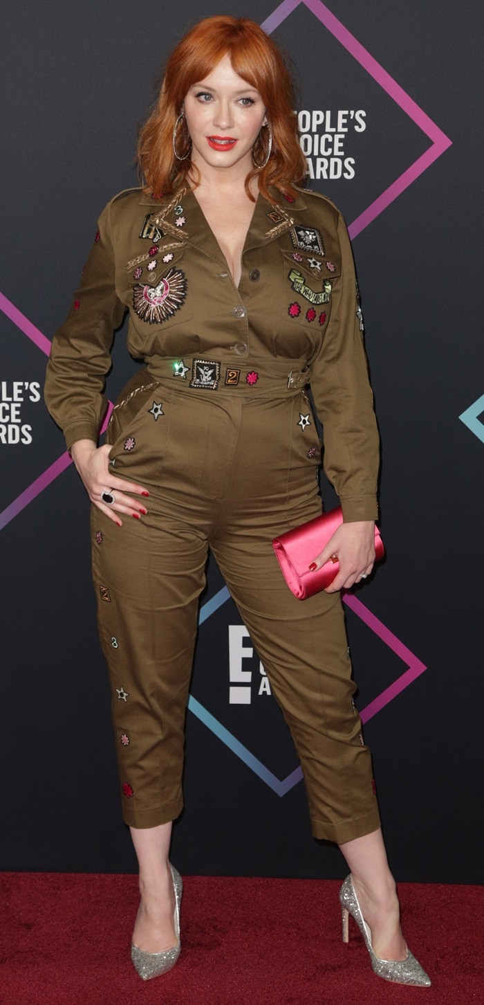 Christina Hendricks flaunted her curves in a green cotton cargo jumpsuit at the 2018 Peoples’ Choice Awards at Barker Hangar in Santa Monica, California, on November 11, 2018