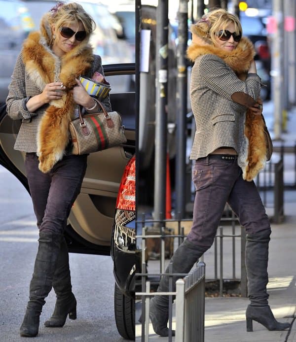 Courtney Love elevates her fall style with a chic fur scarf in New York City