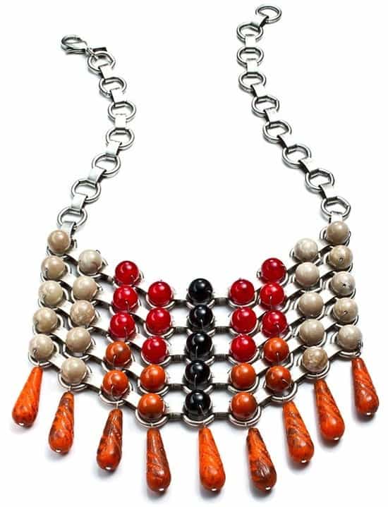 Dannijo 'Medine' Statement Necklace, available for $495 in a striking red version, demonstrating the necklace's versatility and bold fashion statement