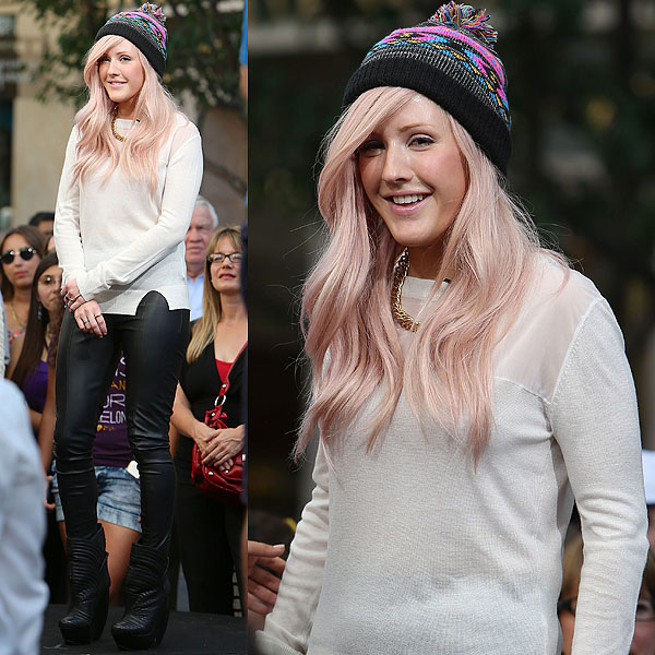 Despite her casual attire, which included a pompom beanie, a white sweater, and leather pants, Ellie Goulding exuded confidence and style on the entertainment news show "Extra"