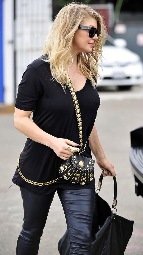 Fergie exudes rockstar flair in Helmut Lang's stretch-leather leggings, captured in Los Angeles on October 11, 2012