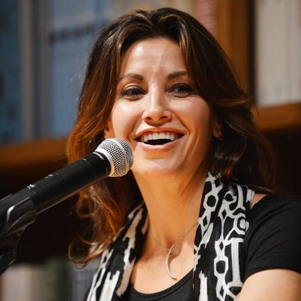 Gina Gershon is an American actress and singer known for her versatile roles in both comedic and dramatic films