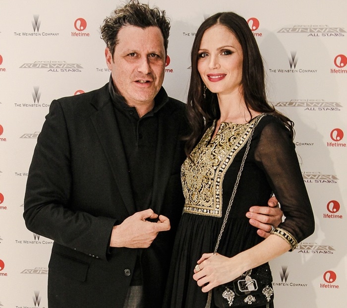 Georgina Chapman, posing with Isaac Mizrahi, looked fabulous with long loose waves