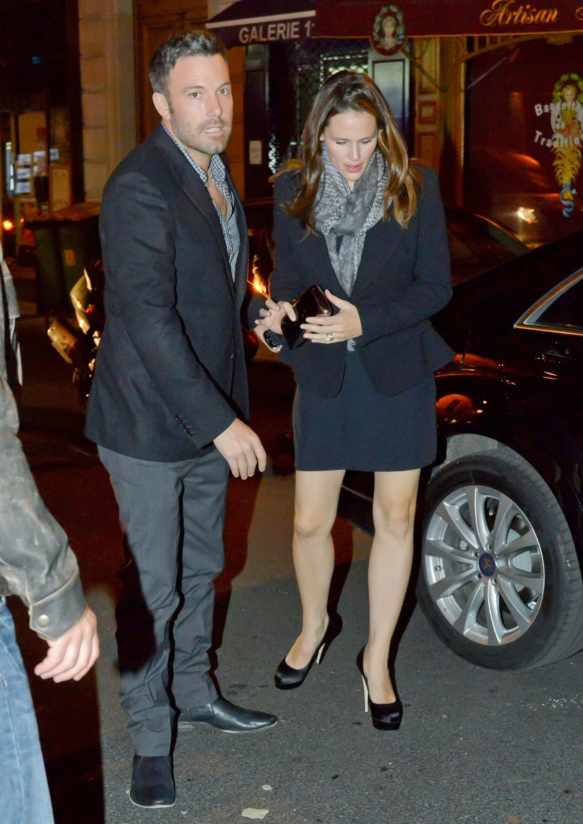 On October 15, 2012, in Paris, Jennifer Garner elegantly styled her black outfit with Brian Atwood's Hamper platform pumps in black satin