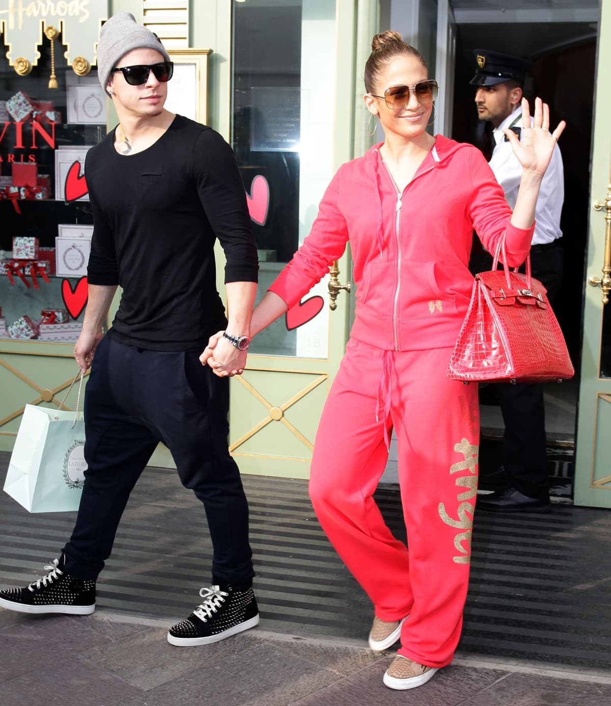 On October 24, 2012, Jennifer Lopez, accompanied by Casper Smart, was spotted leaving London's Harrods department store, stylishly accessorizing her ensemble with a red croc Hermes Birkin