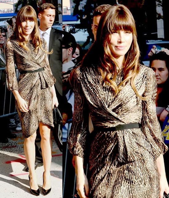In New York City, Jessica Biel's appearance on The Daily Show with Jon Stewart to promote 'Total Recall' featured her in a Giambattista Valli Pre-Fall 2012 animal-print dress paired with a black Fendi '2Jours' leather shopper and Casadei blade patent pumps
