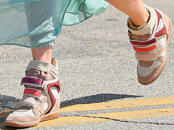 Kate Bosworth styled her dress with Isabel Marant wedge sneakers