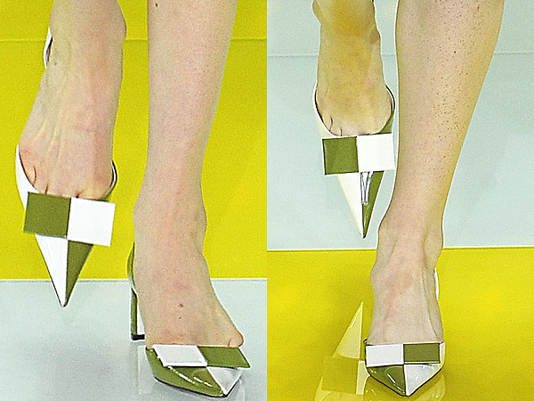 Models strut in checkered pointy toe shoes down the Louis Vuitton Spring/Summer 2013 runway