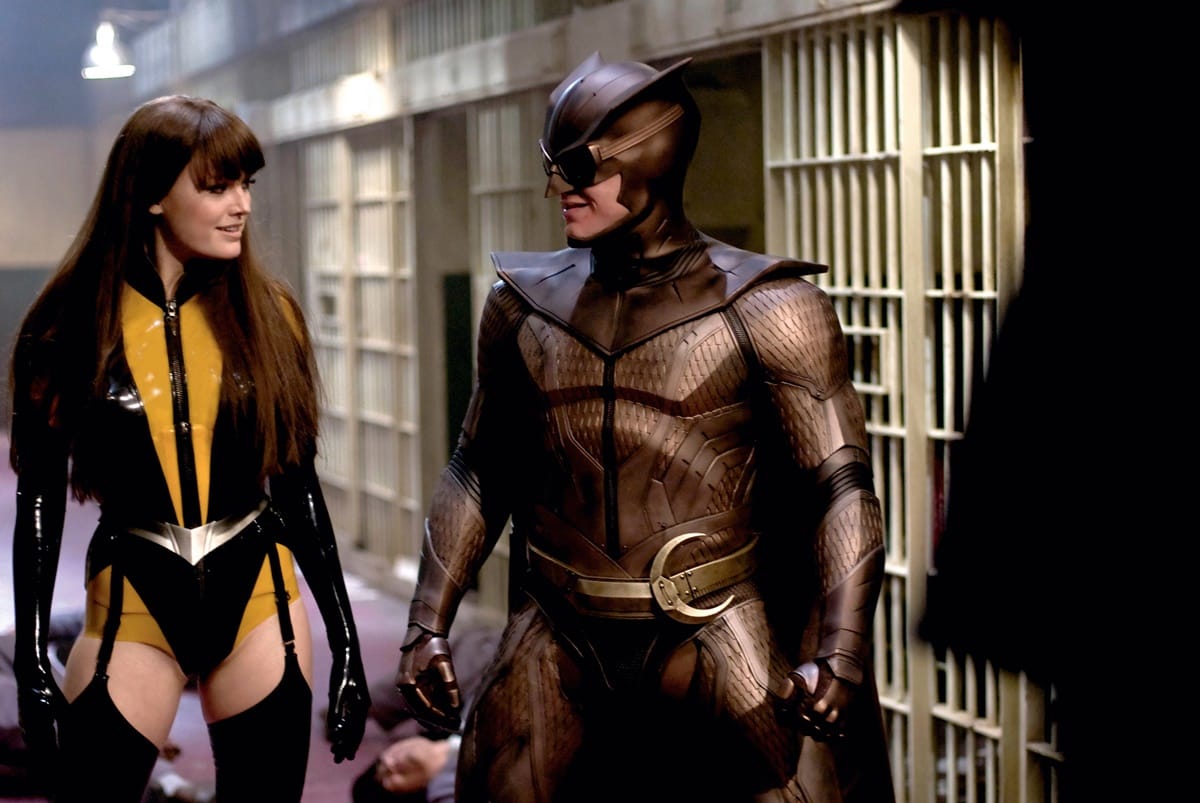 Malin Åkerman as Laurie Jupiter / Silk Spectre II and Patrick Wilson as Daniel Dreiberg / Nite Owl II in the 2009 American superhero thriller film Watchmen