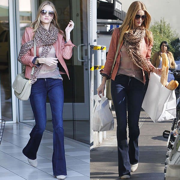 Rosie Huntington-Whiteley exuded chic elegance on December 24, 2011, at Joan's on Third, wearing a blend of high-end fashion pieces including an IRO Ashville washed leather biker jacket, Isabel Marant mohair blend sweater, and M.i.h Jeans Marrakesh jeans, accessorized with a Mulberry Evelina satchel, Salvatore Ferragamo cashmere leopard scarf, Rag & Bone Classic Newbury booties, Tara Agace gold cuff, and completing her look with both Chanel 4195q and Burberry 3051 sunglasses in gold