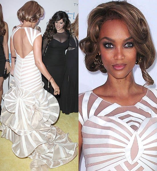 A radiant Tyra Banks steals the spotlight at The Flawsome Ball, her Francis Libiran gown's illusion stripes creating a mesmerizing effect among the glamorous attendees