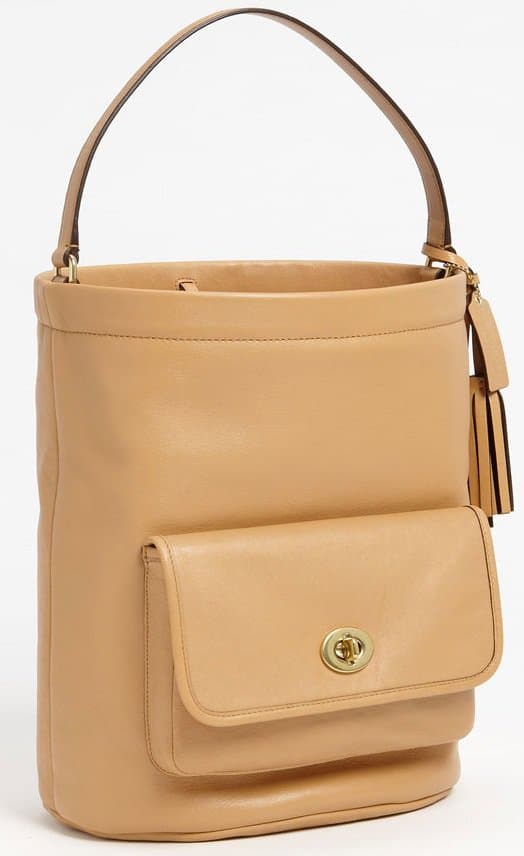 Classically clean lines shape a spacious bucket bag crafted from silky, glove-tanned leather